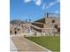 Community amenities include a park with walking path and terraced rock walls at 560 Preston Oak Pl, Las Vegas, NV 89138