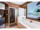 Bathroom with a tub-shower, neutral paint and tile floors at 5929 Caddy Ridge St, North Las Vegas, NV 89031