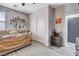 Bedroom with a cozy bed, sliding door closet, and a vintage style nightstand with lamp at 5929 Caddy Ridge St, North Las Vegas, NV 89031