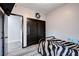 Simple bedroom featuring a metal bed frame and modern decor at 5929 Caddy Ridge St, North Las Vegas, NV 89031
