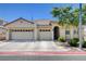 Charming single-story home with a three-car garage and desert landscaping at 5929 Caddy Ridge St, North Las Vegas, NV 89031