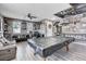 This fun game room boasts hardwood floors, neutral walls, comfortable seating, and an abundance of natural light at 5929 Caddy Ridge St, North Las Vegas, NV 89031