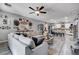 Open living room and kitchen concept with ample seating and natural light at 5929 Caddy Ridge St, North Las Vegas, NV 89031