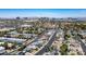 Expansive aerial view highlighting the property's location near the Las Vegas skyline and neighboring homes at 6236 Foothill Blvd, Las Vegas, NV 89118