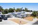 An elevated view of a charming single-story home with a carport and modern solar panels at 6236 Foothill Blvd, Las Vegas, NV 89118
