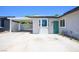 This home has a covered carport, a modern front door, and efficient solar panels at 6236 Foothill Blvd, Las Vegas, NV 89118