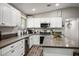 Modern kitchen featuring stainless steel appliances, ample countertop space, and plenty of cabinet space at 6236 Foothill Blvd, Las Vegas, NV 89118