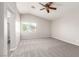 Bright, spacious bedroom with ample natural light and plush carpeting at 6548 Butterfly Sky St, North Las Vegas, NV 89084