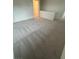Upstairs carpeted loft space with neutral colors, offering versatility as a play area or second living space at 6604 Bowery St, Las Vegas, NV 89148
