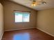 Bedroom with ample natural light and a ceiling fan, showcasing its cozy atmosphere at 7905 Ryandale Cir # 201, Las Vegas, NV 89145