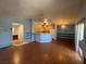Open floor plan showcases the modern kitchen and bright living space at 7905 Ryandale Cir # 201, Las Vegas, NV 89145