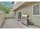 Backyard featuring a concrete patio and a stainless steel grill at 8335 Martinborough Ave, Las Vegas, NV 89131