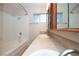 Cozy bathroom with shower-tub combo, tile flooring, and a large vanity with a modern faucet at 860 Bergamont Dr, Henderson, NV 89002