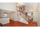 Inviting foyer showcasing high ceilings, wood floors and a staircase leading to upper level at 860 Bergamont Dr, Henderson, NV 89002