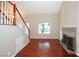 Cozy living room with fireplace and hardwood floors at 860 Bergamont Dr, Henderson, NV 89002