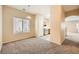 Cozy dining room that transitions into the kitchen area with carpet floors at 8842 Duncan Barrel Ave # 103, Las Vegas, NV 89178