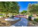 Community park featuring exercise equipment and seating, promoting outdoor activities at 8842 Duncan Barrel Ave # 103, Las Vegas, NV 89178