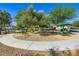 Serene park area featuring seating and shaded spots, perfect for relaxation at 8842 Duncan Barrel Ave # 103, Las Vegas, NV 89178