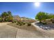 Beautiful neighborhood street view with manicured lawns and sidewalks, showcasing a serene community at 8842 Duncan Barrel Ave # 103, Las Vegas, NV 89178