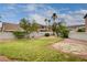 Spacious backyard with lush lawn and desert landscaping offers ample space for outdoor activities and relaxation at 108 Parker Ranch Dr, Henderson, NV 89012