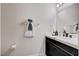 Modern half bathroom with contemporary fixtures, a mirror, and a sleek design at 108 Parker Ranch Dr, Henderson, NV 89012
