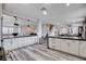 Bright and open kitchen featuring a large island, modern cabinets, and stainless appliances at 108 Parker Ranch Dr, Henderson, NV 89012