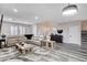 Spacious living room with a comfy sectional, modern decor, and plenty of natural light at 108 Parker Ranch Dr, Henderson, NV 89012