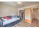 Bedroom with a daybed and unique sliding closet doors offering style and functionality at 161 Swale Ln, Las Vegas, NV 89144