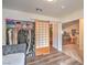Bedroom featuring a closet with unique sliding doors and modern flooring at 161 Swale Ln, Las Vegas, NV 89144