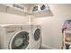 Convenient laundry room featuring modern washer and dryer at 161 Swale Ln, Las Vegas, NV 89144