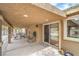 Covered patio with dining furniture providing an ideal outdoor living space at 161 Swale Ln, Las Vegas, NV 89144