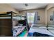 This bedroom features a bunk bed and a twin bed at 1949 King Hill St, Las Vegas, NV 89106