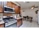 Bright kitchen featuring stainless steel appliances, and dining area at 1949 King Hill St, Las Vegas, NV 89106