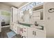 Bathroom vanity with double sinks, tile backsplash, and a large window at 1951 Jim Haworth Ct, Logandale, NV 89021