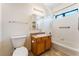 Bathroom featuring a vanity with storage and a shower-tub with tiled surround at 2141 Hussium Hills St # 108, Las Vegas, NV 89108