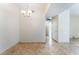 Bright dining area with stylish tile flooring, and convenient access to other parts of the home at 2141 Hussium Hills St # 108, Las Vegas, NV 89108