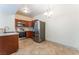 Modern kitchen featuring stainless steel appliances, quartz countertops, and wood cabinetry at 2141 Hussium Hills St # 108, Las Vegas, NV 89108