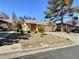 Charming single-story home with a two-car garage, desert landscaping, and a tile roof in a quiet neighborhood at 3619 Edinburgh Dr, Las Vegas, NV 89103