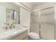 Updated bathroom features modern vanity, sink, and shower with glass doors at 4416 Rip Van Winkle Ln, Las Vegas, NV 89102