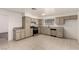 Bright kitchen with tile floors, stainless steel appliances, and ample cabinet space at 4416 Rip Van Winkle Ln, Las Vegas, NV 89102