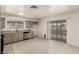 Bright kitchen featuring stainless steel appliances, granite countertops, and backyard access at 4416 Rip Van Winkle Ln, Las Vegas, NV 89102
