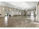A spacious hall features beautiful wood floors, neutral walls, and elegant lighting at 4908 Winterset Dr, Las Vegas, NV 89130