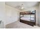 bedroom with bunk beds, carpet, and white walls at 5617 Craftsman Ave, Las Vegas, NV 89122