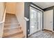 Carpeted staircase leading to an outdoor patio through sliding glass doors at 5617 Craftsman Ave, Las Vegas, NV 89122