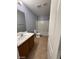 Neutral bathroom with matching fixtures and tile flooring at 8089 Windmill Villa St, Las Vegas, NV 89139