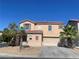 Charming two-story home with a well-maintained front yard and a spacious two-car garage at 8089 Windmill Villa St, Las Vegas, NV 89139