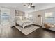 Spacious main bedroom with wood floors and ensuite bathroom at 8325 Winterchase Pl, Las Vegas, NV 89143