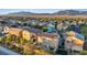 The rear exterior displays a well-maintained home with solar panels and a neatly landscaped yard at 8325 Winterchase Pl, Las Vegas, NV 89143
