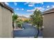 Neighborhood street view with mountain views, homes and trees at 8325 Winterchase Pl, Las Vegas, NV 89143