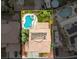 Aerial view of a private backyard featuring a pool, jacuzzi and lush garden, creating a serene outdoor retreat at 8929 Monte Oro Dr, Las Vegas, NV 89131